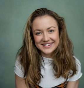 Headshot of musical director, Lucy