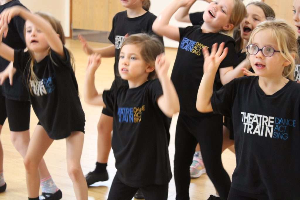 Children taking part in performing arts classes in Maldon and Witham at Theatretrain, learning singing, dancing and acting skills