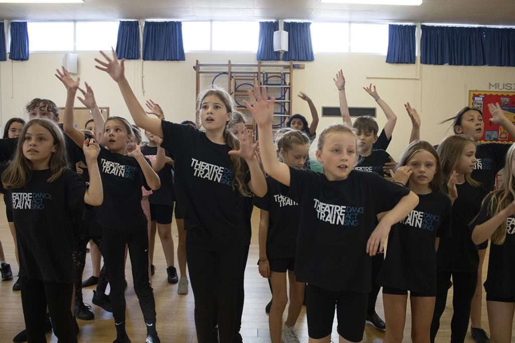 Young actor building confidence in a Theatretrain Maldon performing arts class, Essex, UK.