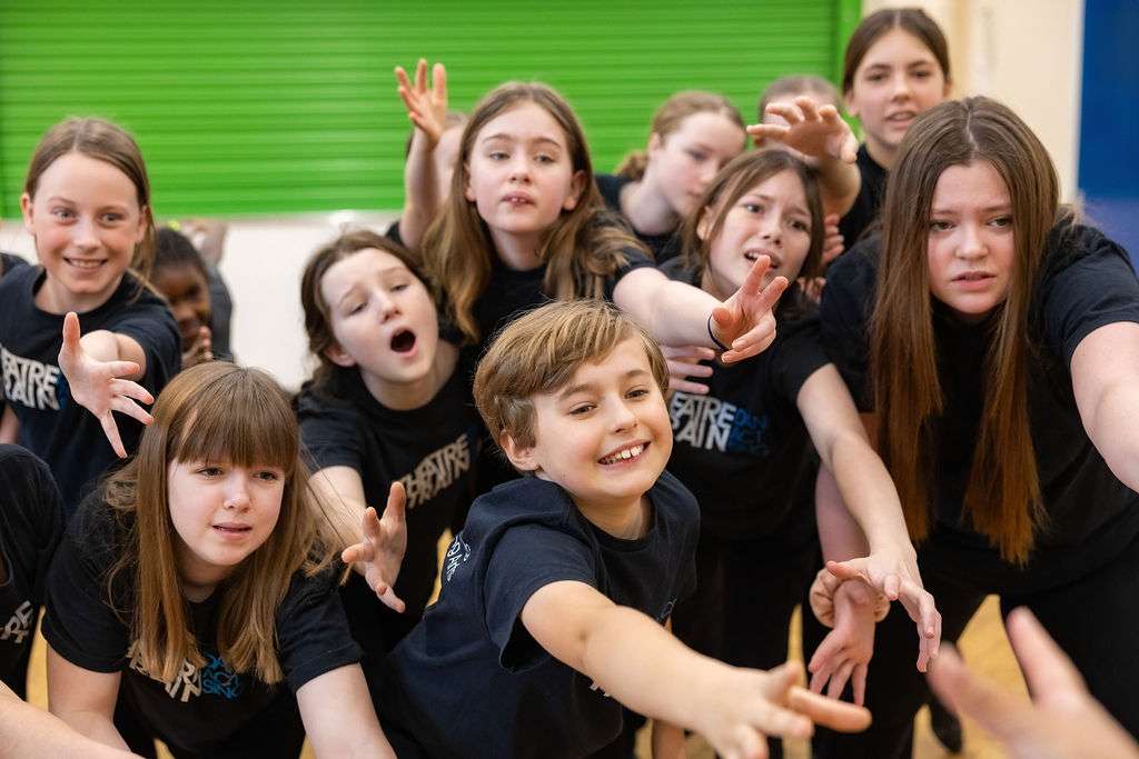 Children taking leadership roles during rehearsal at Theatretrain Maldon in Essex.