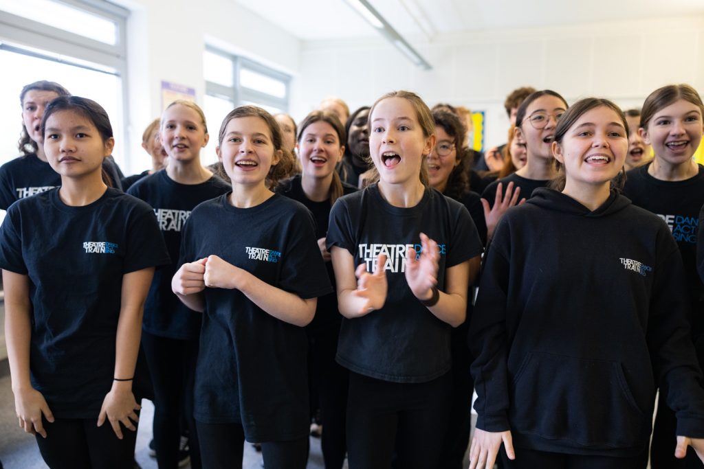 Children taking part in singing, dancing and acting classes, building skills for school and life.